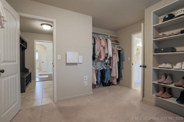 4314 S 132nd E Ave, Tulsa, OK 74134 - walk in closet featuring light carpet and light tile patterned floors