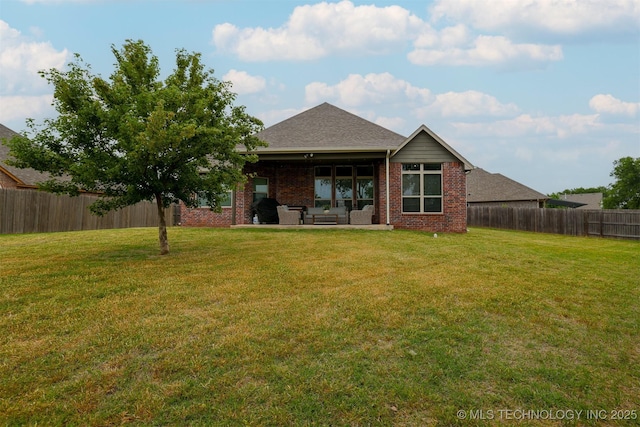 4314 S 132nd E Ave, Tulsa, OK 74134 - rear view of property featuring brick siding and a patio area