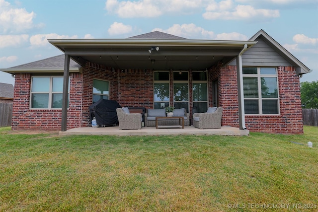4314 S 132nd E Ave, Tulsa, OK 74134 - rear view of property with brick siding, outdoor lounge area, and a patio area