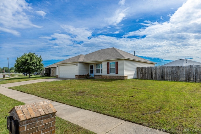 ranch-style house featuring an attached garage and driveway