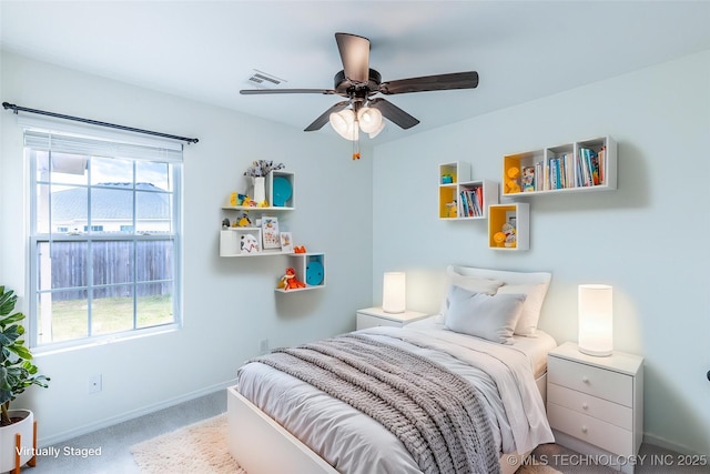 bedroom with carpet, baseboards, and ceiling fan