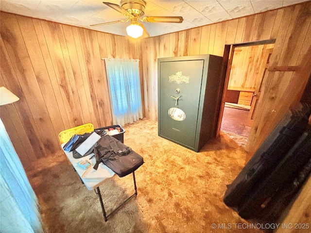 30190 W County Road 1240, Stigler, OK 74462 - unfurnished bedroom with wooden walls, carpet, and a ceiling fan