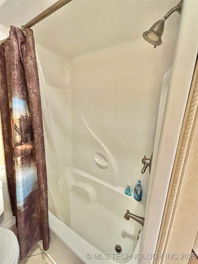 30190 W County Road 1240, Stigler, OK 74462 - bathroom with curtained shower, tile patterned floors, and toilet