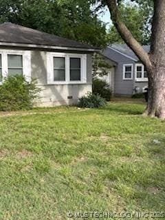 3527 S Knoxville Ave, Tulsa, OK 74135 - view of side of home with a lawn