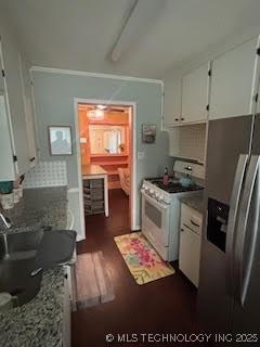 3527 S Knoxville Ave, Tulsa, OK 74135 - kitchen featuring white gas stove, stainless steel refrigerator with ice dispenser, white cabinets, and dark wood-type flooring