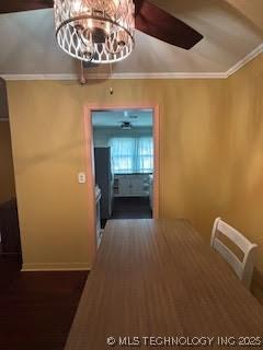 3527 S Knoxville Ave, Tulsa, OK 74135 - unfurnished dining area featuring a chandelier, crown molding, and lofted ceiling