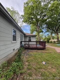 3527 S Knoxville Ave, Tulsa, OK 74135 - view of grassy yard with a deck