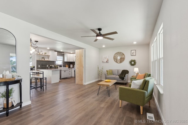425 Mulberry Ave, Afton, OK 74331 - living room featuring wood finished floors, baseboards, recessed lighting, and ceiling fan