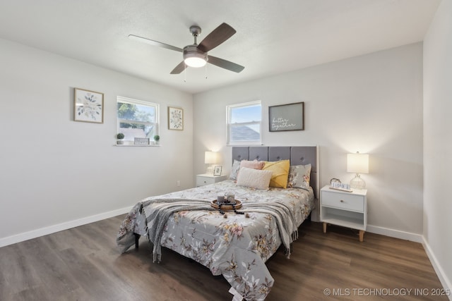 425 Mulberry Ave, Afton, OK 74331 - bedroom with wood finished floors, baseboards, and ceiling fan