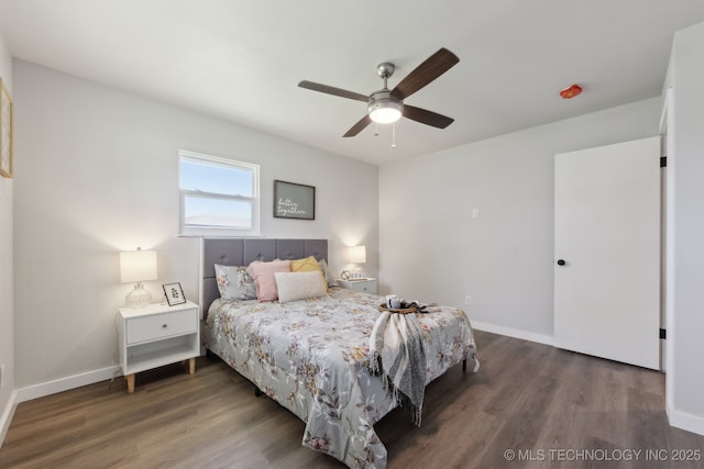 425 Mulberry Ave, Afton, OK 74331 - bedroom with wood finished floors, baseboards, and ceiling fan