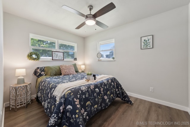 425 Mulberry Ave, Afton, OK 74331 - bedroom with wood finished floors, baseboards, and ceiling fan
