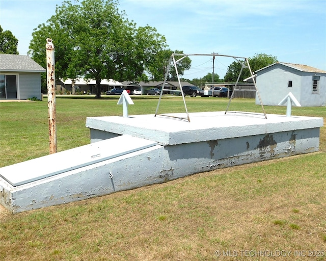 68 W Youth Cp, Healdton, OK 73438 - entry to storm shelter featuring a yard
