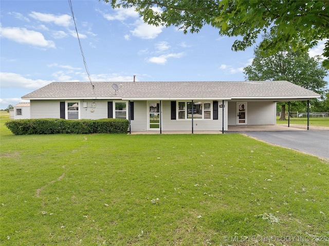 68 W Youth Cp, Healdton, OK 73438 - single story home with an attached carport, a front yard, driveway, and roof with shingles
