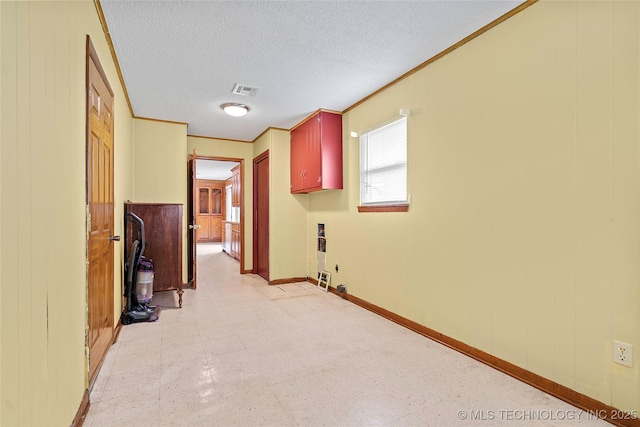 68 W Youth Cp, Healdton, OK 73438 - hall with ornamental molding, a textured ceiling, light floors, wooden walls, and baseboards