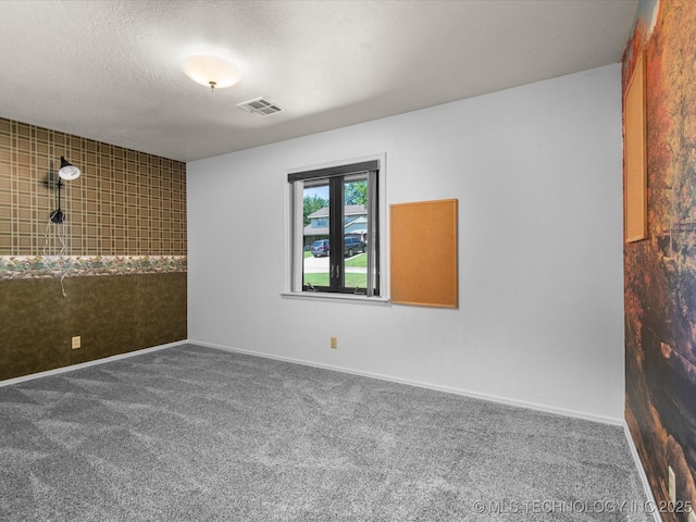1044 Meadow Dr, Bartlesville, OK 74006 - carpeted spare room with baseboards