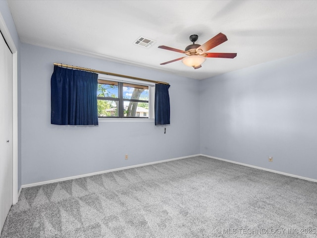1044 Meadow Dr, Bartlesville, OK 74006 - unfurnished room with carpet, a ceiling fan, and baseboards