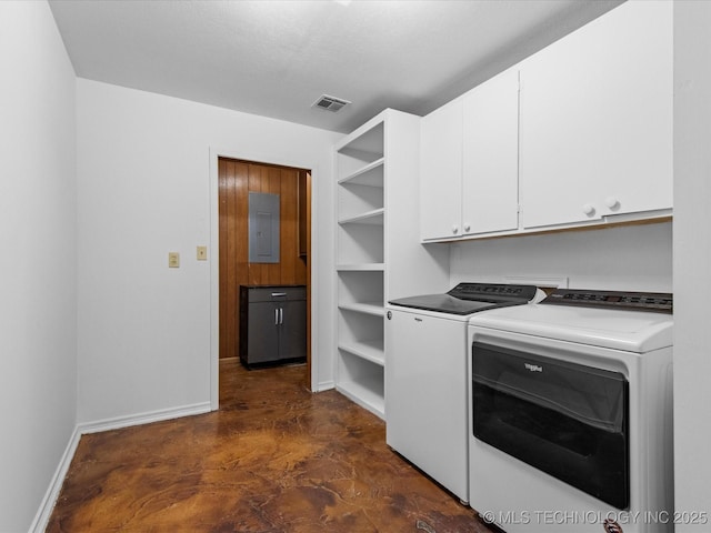 1044 Meadow Dr, Bartlesville, OK 74006 - clothes washing area with cabinet space, washing machine and dryer, electric panel, and baseboards