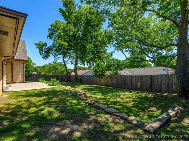 1044 Meadow Dr, Bartlesville, OK 74006 - view of yard with a patio