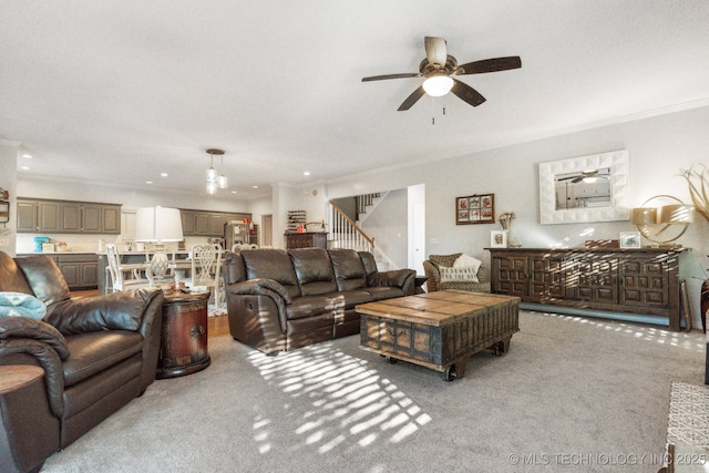 7646 S Fulton Ave, Tulsa, OK 74136 - living area with crown molding, carpet, ceiling fan, stairway, and recessed lighting