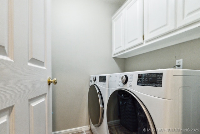 7646 S Fulton Ave, Tulsa, OK 74136 - laundry area with cabinet space, washing machine and clothes dryer, and baseboards
