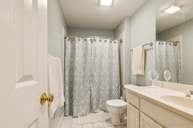 7646 S Fulton Ave, Tulsa, OK 74136 - bathroom featuring tile patterned flooring, toilet, vanity, and a shower with shower curtain