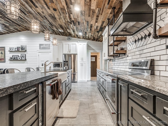 29550 S 4240th Rd, Inola, OK 74036 - kitchen with stainless steel appliances, open shelves, lofted ceiling, white cabinets, and decorative backsplash