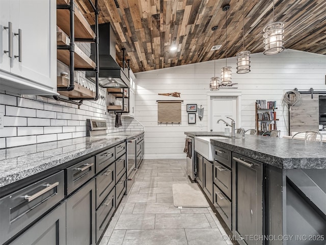 29550 S 4240th Rd, Inola, OK 74036 - kitchen with vaulted ceiling, electric stove, a sink, wood ceiling, and wall chimney exhaust hood