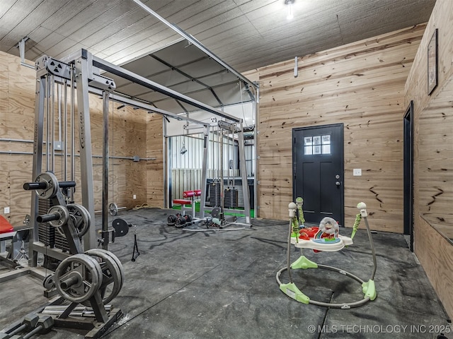 29550 S 4240th Rd, Inola, OK 74036 - workout area featuring a garage and wood walls