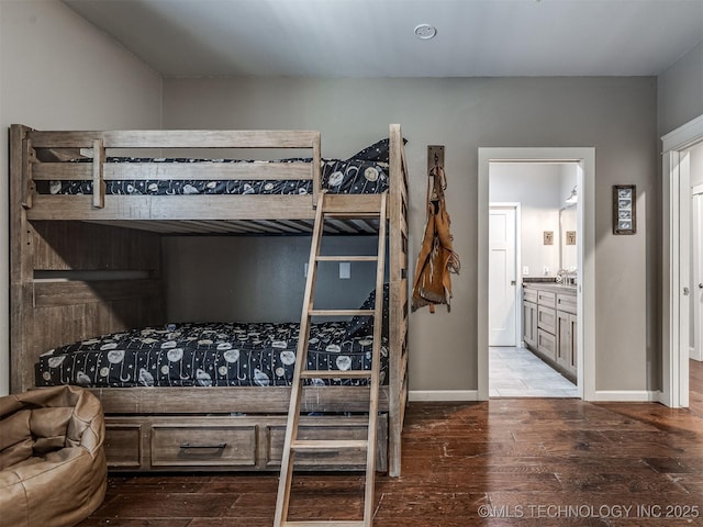 29550 S 4240th Rd, Inola, OK 74036 - bedroom with hardwood / wood-style flooring, connected bathroom, and baseboards