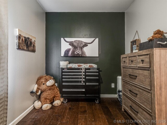 29550 S 4240th Rd, Inola, OK 74036 - bedroom featuring dark wood finished floors and baseboards