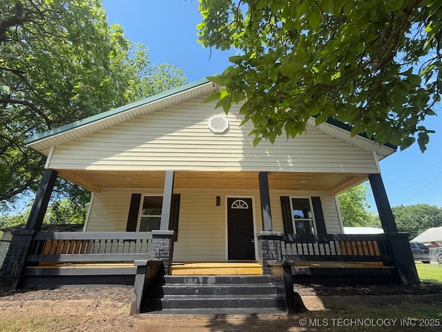 618 E Gentry Ave, Checotah, OK 74426 - view of front of property featuring covered porch