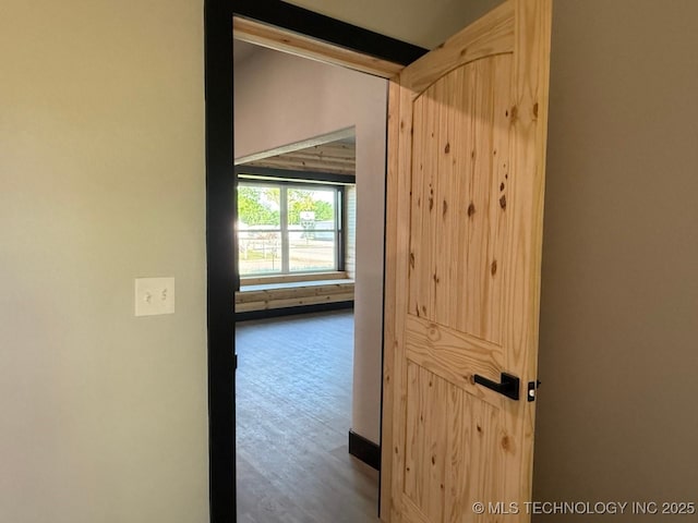 618 E Gentry Ave, Checotah, OK 74426 - hallway with wood finished floors