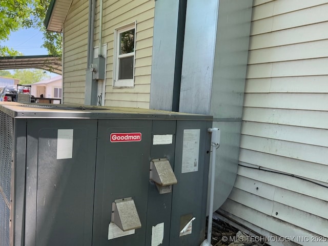 618 E Gentry Ave, Checotah, OK 74426 - exterior view of central AC unit and electric meter