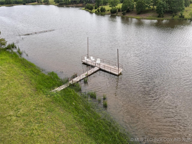 5831 Evans, Kingston, OK 73439 - dock area featuring a water view