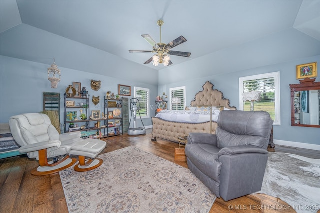 30230 S 562, Afton, OK 74331 - bedroom featuring vaulted ceiling, multiple windows, wood finished floors, ceiling fan, and baseboards