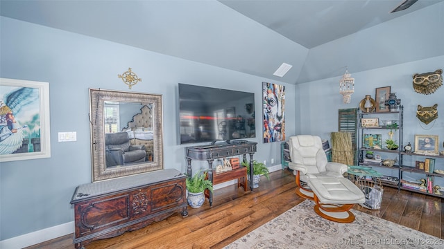 30230 S 562, Afton, OK 74331 - sitting room with lofted ceiling, wood finished floors, and baseboards