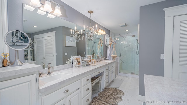30230 S 562, Afton, OK 74331 - full bath featuring a chandelier, a marble finish shower, marble look tiles, a closet, and recessed lighting