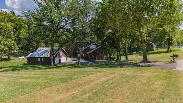30230 S 562, Afton, OK 74331 - view of grassy yard with a garage and an outdoor structure