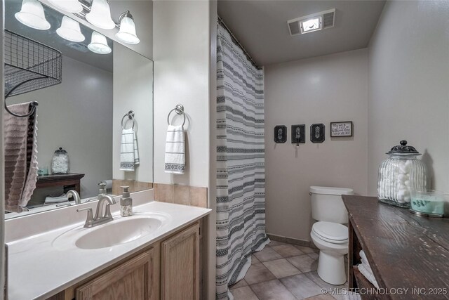 8212 S Delaware Pl, Tulsa, OK 74137 - full bath featuring vanity, toilet, tile patterned floors, and a shower with shower curtain