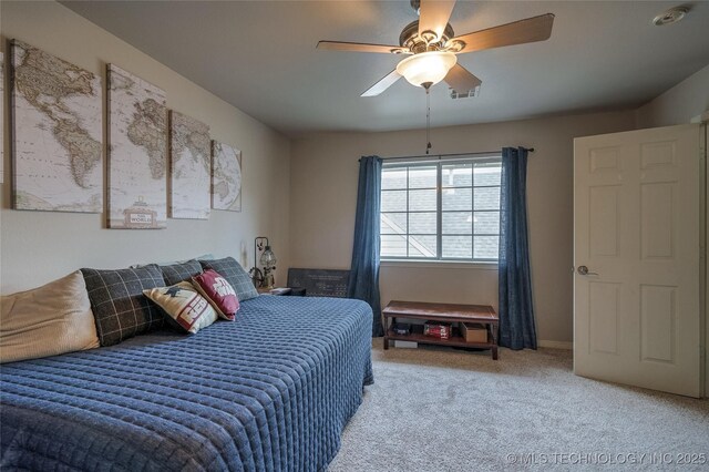 8212 S Delaware Pl, Tulsa, OK 74137 - carpeted bedroom with a ceiling fan