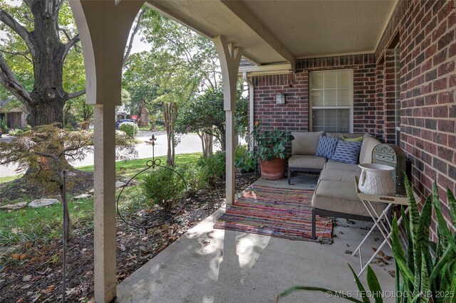8212 S Delaware Pl, Tulsa, OK 74137 - view of patio / terrace with an outdoor living space