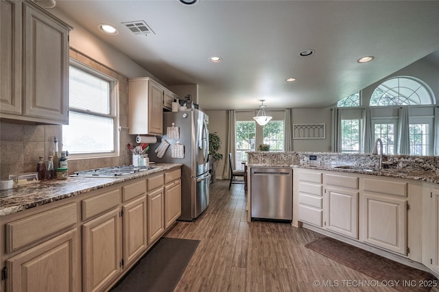 8212 S Delaware Pl, Tulsa, OK 74137 - kitchen with stainless steel appliances, a sink, recessed lighting, tasteful backsplash, and light wood finished floors