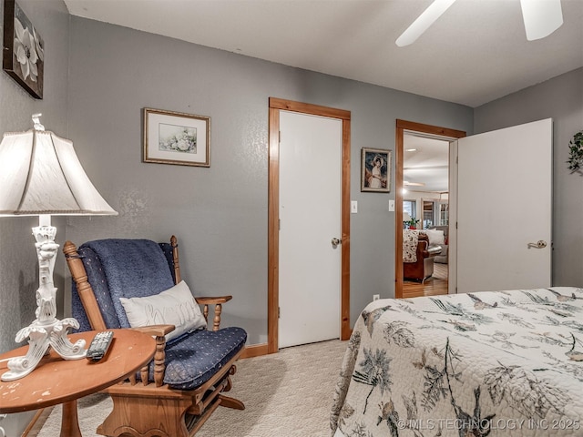 bedroom with light colored carpet and ceiling fan