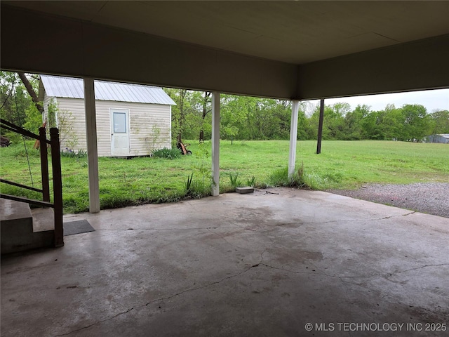 view of patio with an outdoor structure