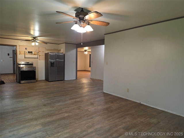 kitchen with appliances with stainless steel finishes, ceiling fan, wood finished floors, and baseboards