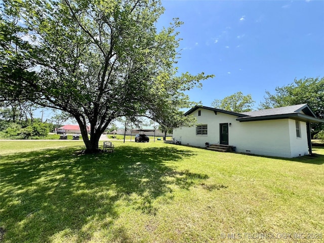 205 NE 1st St, Kingston, OK 73439 - view of green lawn