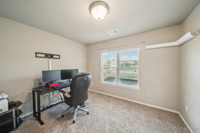 home office with carpet flooring and baseboards