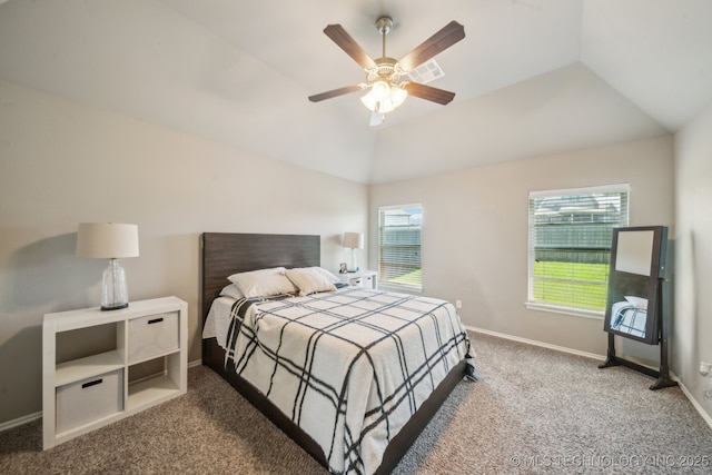 carpeted bedroom featuring baseboards, vaulted ceiling, and a ceiling fan