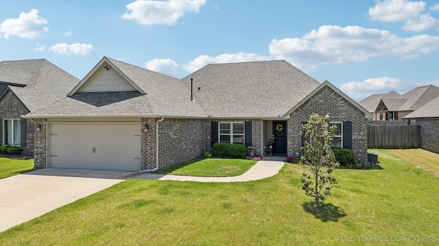 view of front of house featuring an attached garage, brick siding, roof with shingles, and concrete driveway