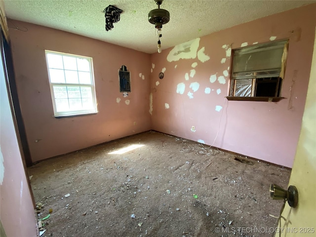 40821 N 3956th Dr, Skiatook, OK 74070 - spare room featuring a textured ceiling